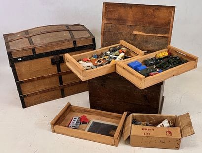 Wooden trunk containing three trays of plastic...