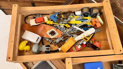Wooden trunk containing three trays of plastic...
