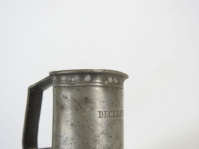 TWO pewter MEASUREMENTS. One signed BREMONTIER,...