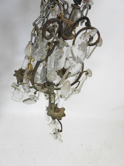 Three-light metal cage chandelier adorned...