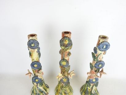 POPULAR ART: Three glazed terracotta candleholders...