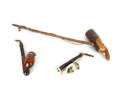LOT of pipes and calumet in carved wood and...