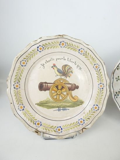 NEVERS: Three earthenware scalloped rim plates...