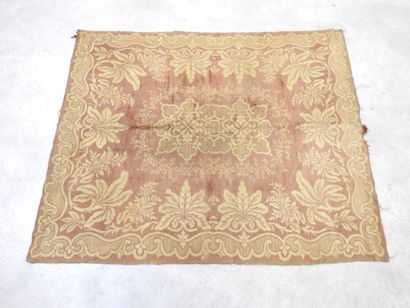 RUG with old-red foliage on a beige background....