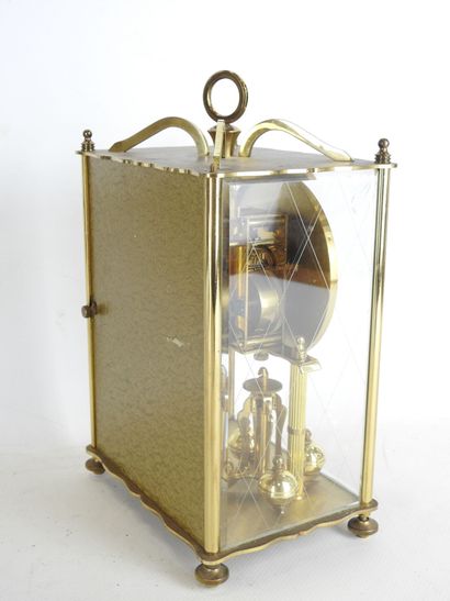 TROPHY : Horloge en fer forgé à décor feuillagé,...