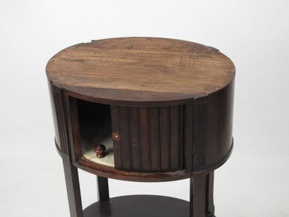 Mahogany oval curtain CHEVET resting on four...