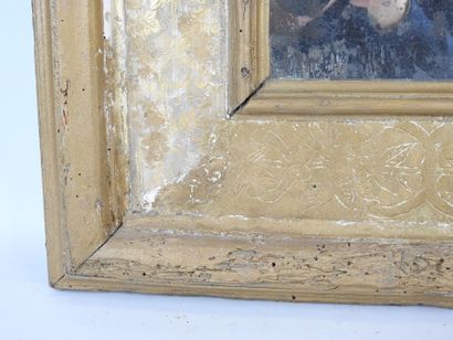 Gilded stuccoed wood mirror with incised...