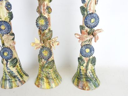 POPULAR ART: Three glazed terracotta candleholders...