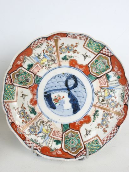 JAPAN: Three porcelain plates with blue,...