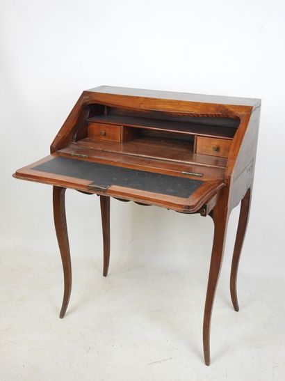 Walnut veneered sloping desk, opening with...