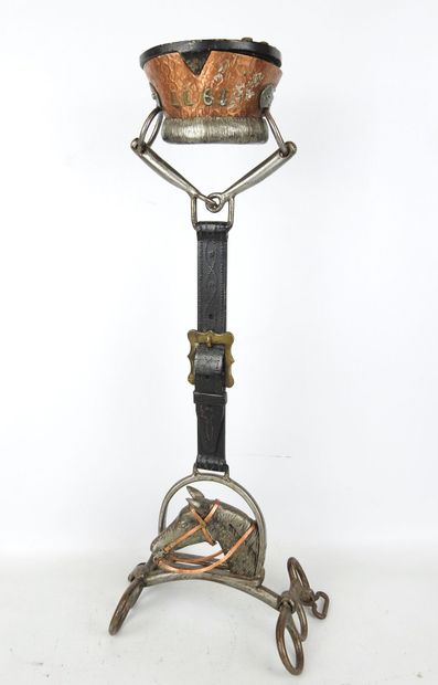 Standing ashtray in wrought iron and copper...