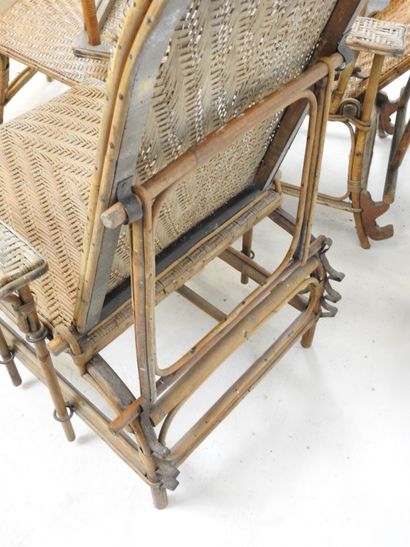 PAIR OF LONG CHAIRS in woven rattan. Can...