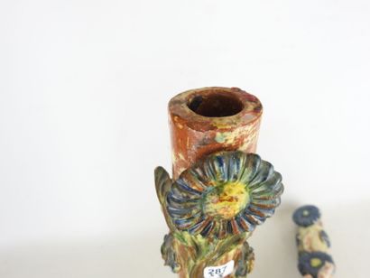 POPULAR ART: Three glazed terracotta candleholders...
