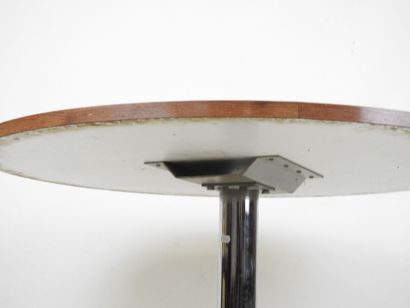 Circular TABLE with Formica top resting on...