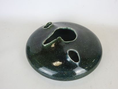 Green enameled stoneware ovoid vase with...