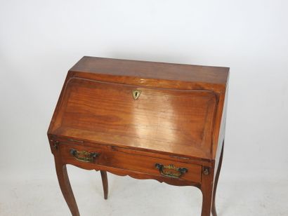 Walnut veneered sloping desk, opening with...