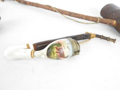 LOT of pipes and calumet in carved wood and...