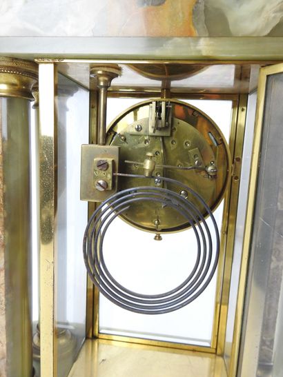 Glass, bronze and onyx cage clock topped...