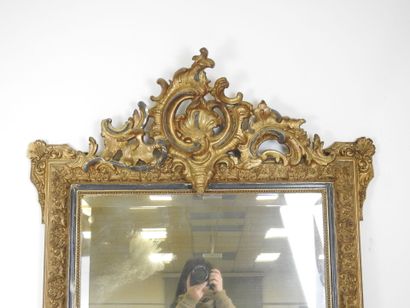 Gilded stuccoed wood MIRROR with foliate...