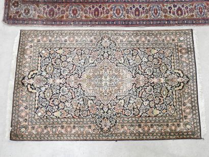 TWO WOOL RUGS, one Iran with floral design...