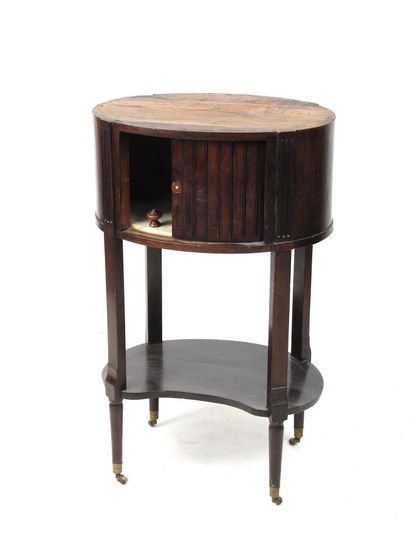 Mahogany oval curtain CHEVET resting on four...