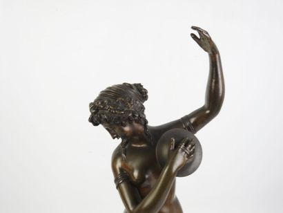 Ménade, cymbal player and faun. Bronze with...