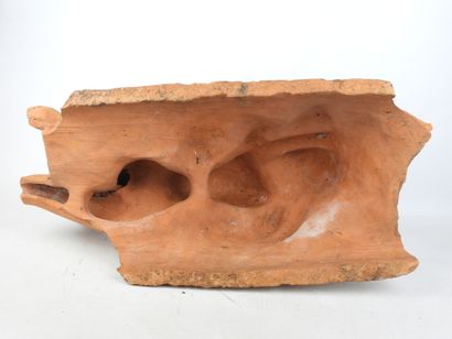 Nude woman lying on a sheaf of wheat, terracotta....