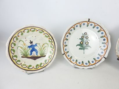 CENTER: Three earthenware plates with floral...