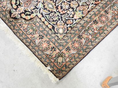 TWO WOOL RUGS, one Iran with floral design...