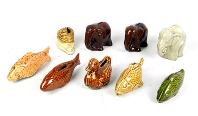 LOT of nine glazed ceramic piggy banks decorated...