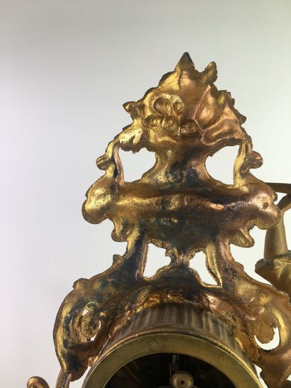 PENDULE in chased and gilded regule, the...