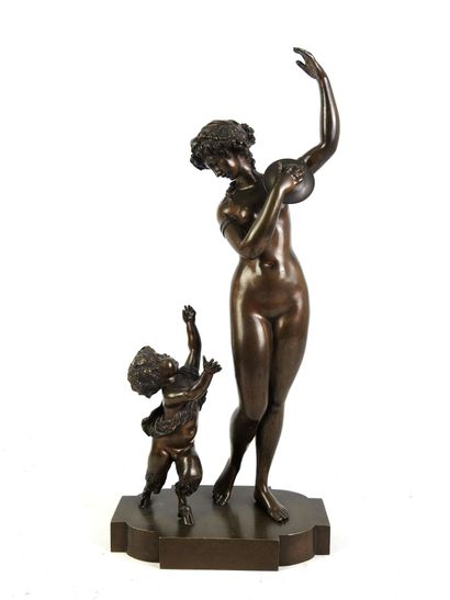 Ménade, cymbal player and faun. Bronze with...