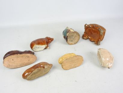 LOT of seven glazed ceramic piggy banks decorated...