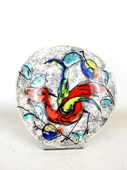 Glazed ceramic plate decorated with a stylized...