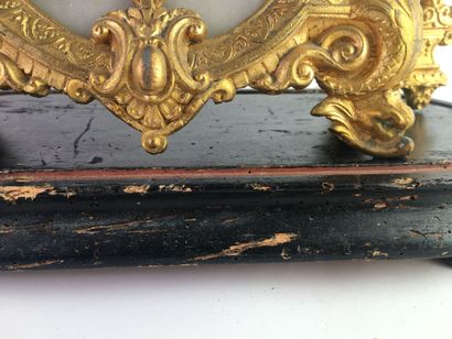 PENDULE in chased and gilded regule, the...