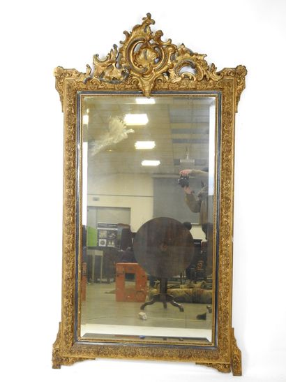 Gilded stuccoed wood MIRROR with foliate...