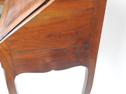 Walnut veneered sloping desk, opening with...