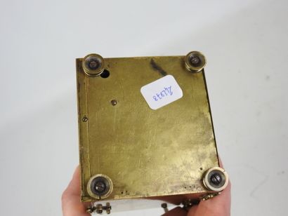 brass TRAVEL CLOCK, enameled dial with Arabic...