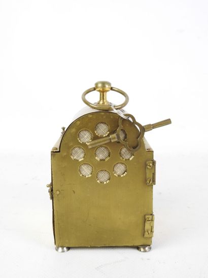 brass TRAVEL CLOCK, enameled dial with Arabic...