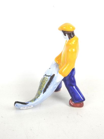 HENRIOT Quimper: Fisherman with fish. Earthenware...