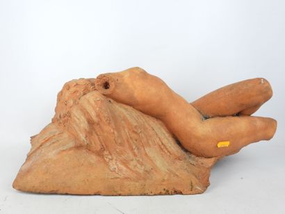 Nude woman lying on a sheaf of wheat, terracotta....