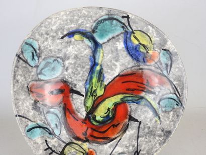 Glazed ceramic plate decorated with a stylized...