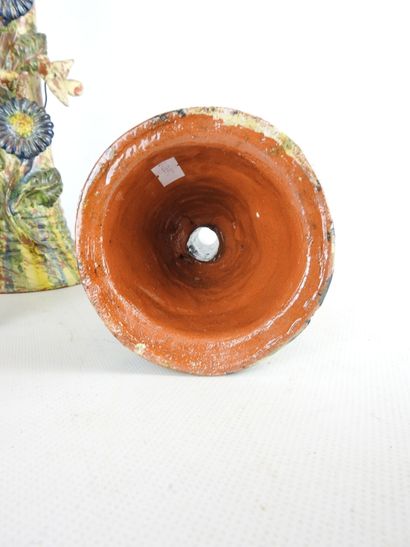 POPULAR ART: Three glazed terracotta candleholders...