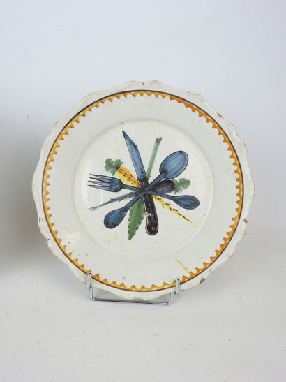 NEVERS: Two earthenware plates with polychrome...