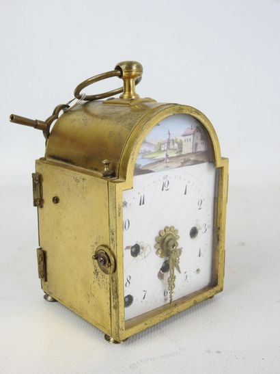 brass TRAVEL CLOCK, enameled dial with Arabic...
