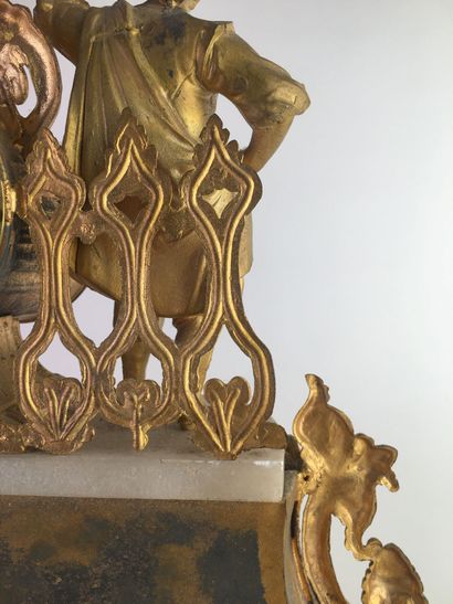 PENDULE in chased and gilded regule, the...