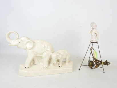 L. FRANCOIS (XXth): Elephants. Crackled ceramic...