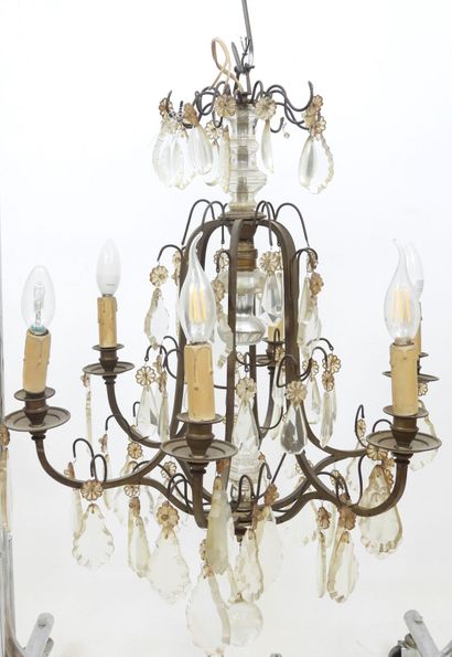 Iron chandelier with six arms adorned with...