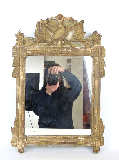Gilded stuccoed wood MIRROR, the pediment...