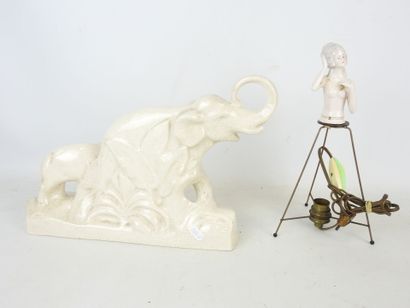 L. FRANCOIS (XXth): Elephants. Crackled ceramic...